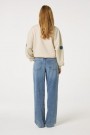 Fabienne Chapot Oatmeal melange 100% organisk bomull 'Luna Sweater' collage med solmerker thumbnail
