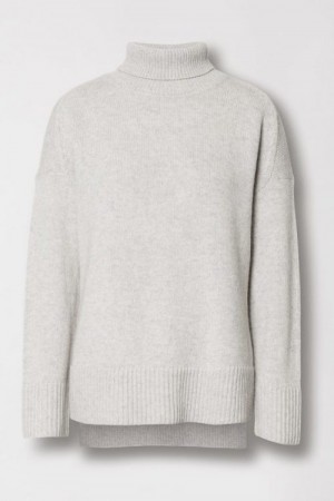Cathrine Hammel praktfull lys gråmelert oversized pologenser med splitt av YAK/merino